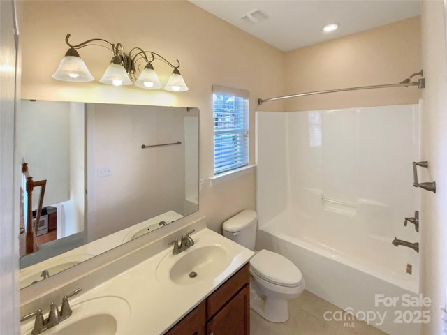 full bathroom featuring bathtub / shower combination, a sink, toilet, and double vanity