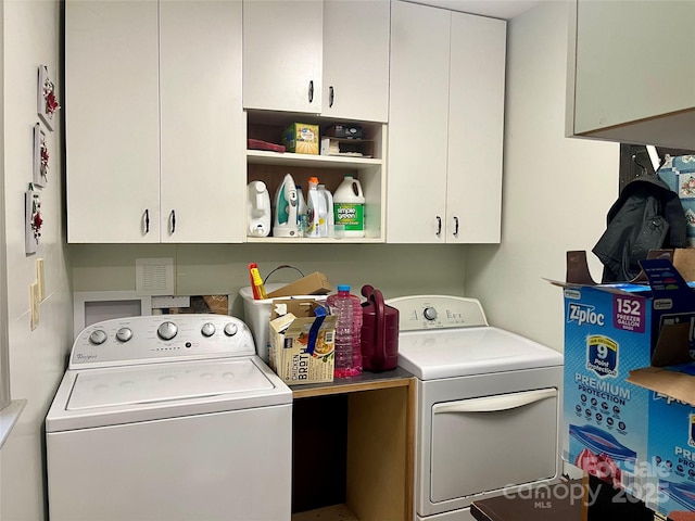 1496 Givens St, Hickory, NC 28602 - washroom featuring washer and dryer and cabinet space