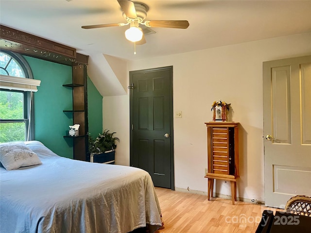1496 Givens St, Hickory, NC 28602 - bedroom with light wood-style flooring and ceiling fan
