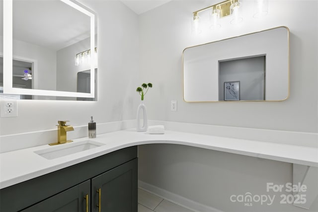 bathroom featuring tile patterned floors and vanity