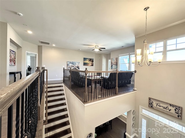 interior space featuring baseboards, visible vents, a chandelier, and recessed lighting