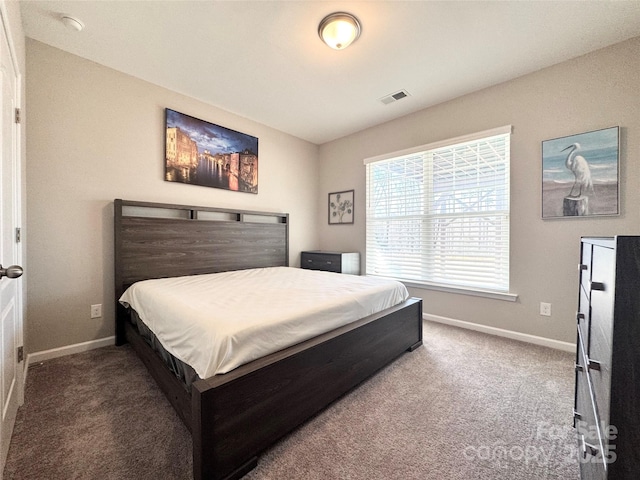 bedroom featuring carpet floors, baseboards, and visible vents