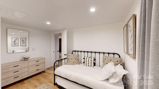 bedroom featuring recessed lighting and light wood-style floors