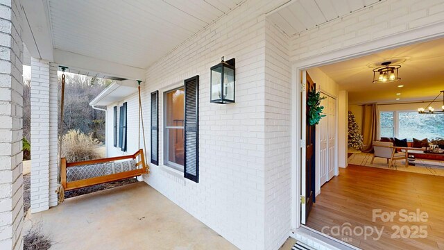 169 Chandler Rd, Alexander, NC 28701 - view of patio / terrace featuring covered porch