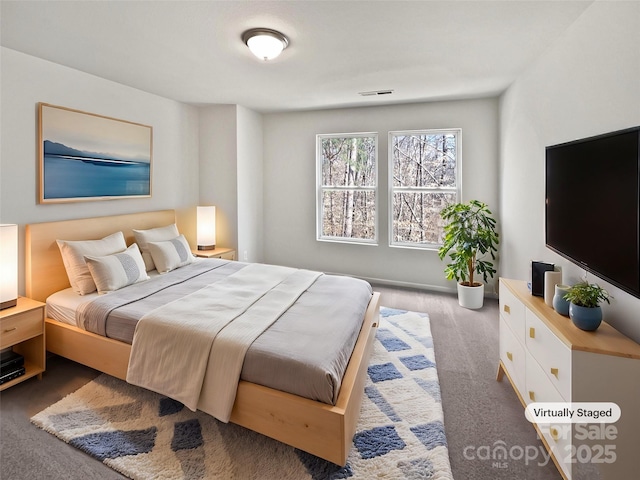 bedroom featuring visible vents