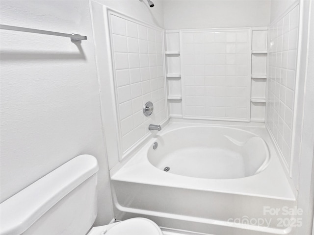 full bath featuring washtub / shower combination and toilet