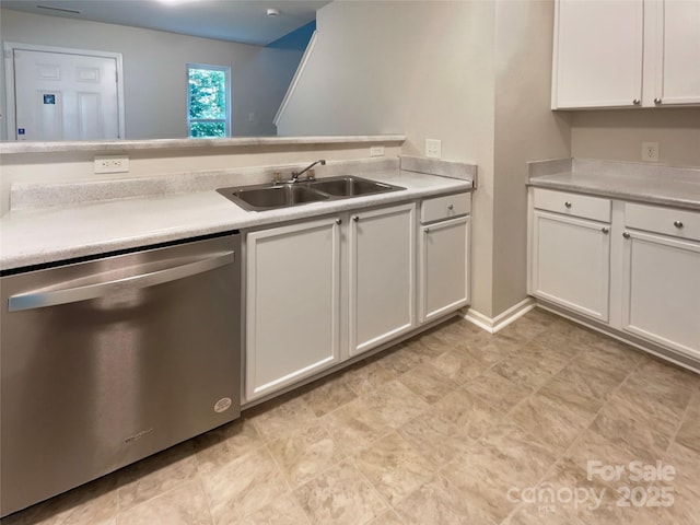1121 Swearngan Ridge Ct, Charlotte, NC 28216 - kitchen featuring stainless steel dishwasher, white cabinetry, and light countertops