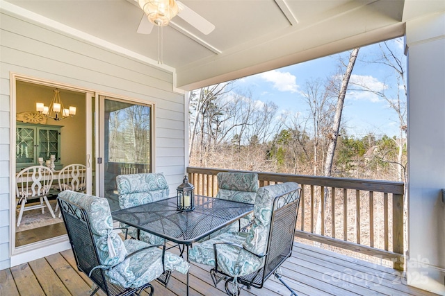 14707 Batteliere Dr, Charlotte, NC 28278 - deck featuring a ceiling fan and outdoor dining space