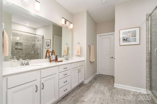 14707 Batteliere Dr, Charlotte, NC 28278 - full bath featuring double vanity, a stall shower, and a sink