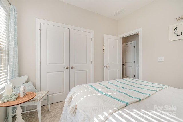 14707 Batteliere Dr, Charlotte, NC 28278 - bedroom with light carpet and a closet