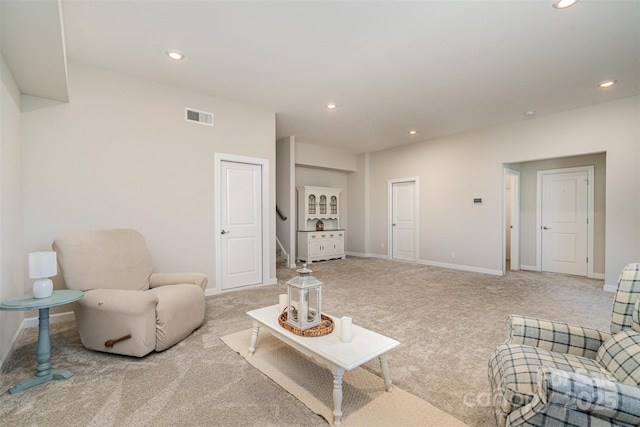 14707 Batteliere Dr, Charlotte, NC 28278 - living area with recessed lighting, light carpet, visible vents, baseboards, and stairs