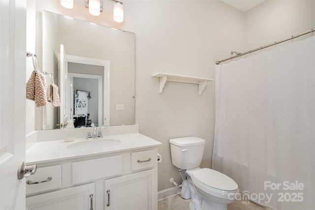 14707 Batteliere Dr, Charlotte, NC 28278 - full bathroom with toilet, baseboards, and vanity