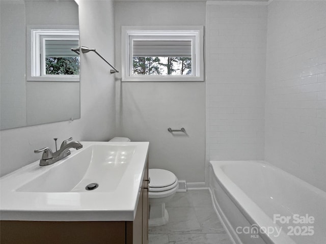 full bathroom featuring marble finish floor, baseboards, vanity, and toilet