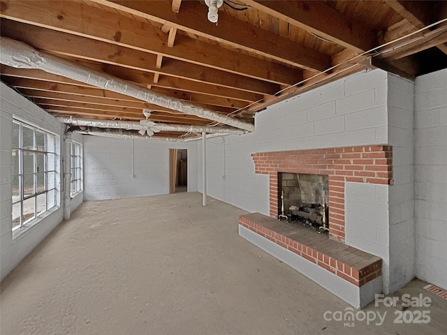 below grade area featuring a fireplace