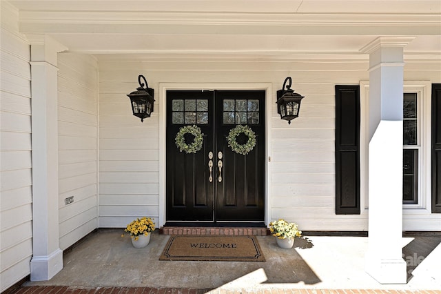 entrance to property with a porch