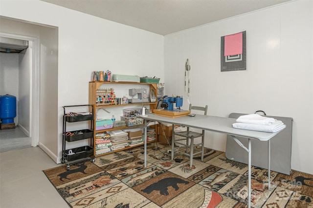 home office featuring concrete flooring