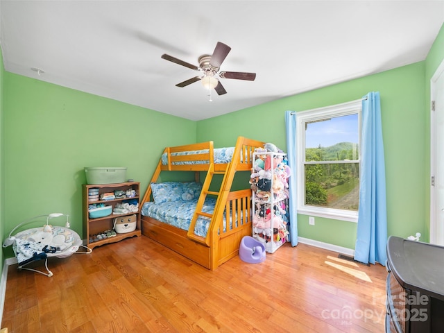 48 Meadowlark Ln, Spruce Pine, NC 28777 - bedroom with wood finished floors, ceiling fan, and baseboards