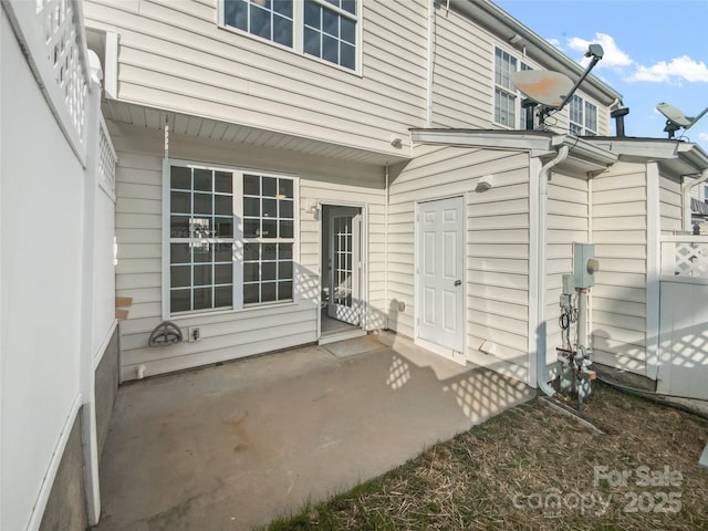 rear view of house with a patio