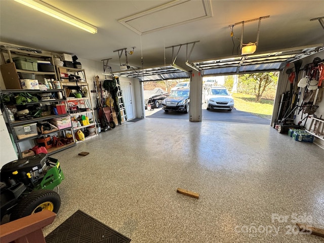 garage featuring a garage door opener