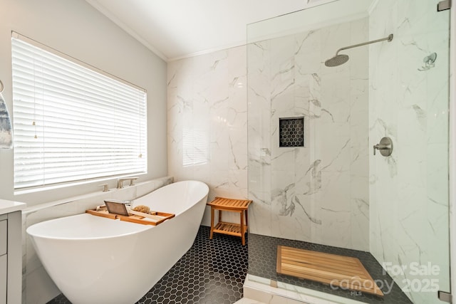 full bath featuring crown molding, a soaking tub, and a marble finish shower