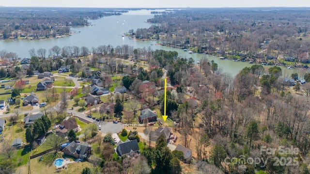 aerial view with a water view and a residential view