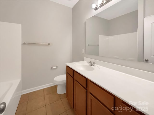 full bath with a tub to relax in, a shower, toilet, tile patterned flooring, and vanity