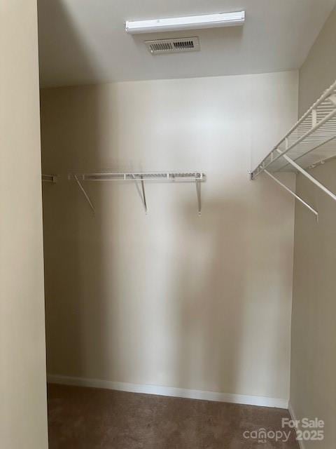 walk in closet featuring visible vents