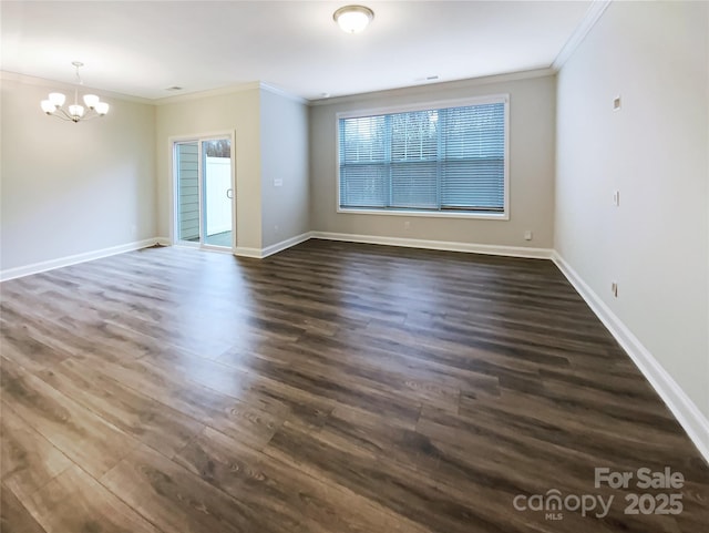 unfurnished room with ornamental molding, dark wood-style flooring, and baseboards