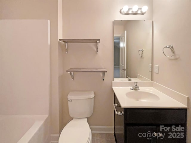 full bath with baseboards, toilet, a bathing tub, tile patterned floors, and vanity