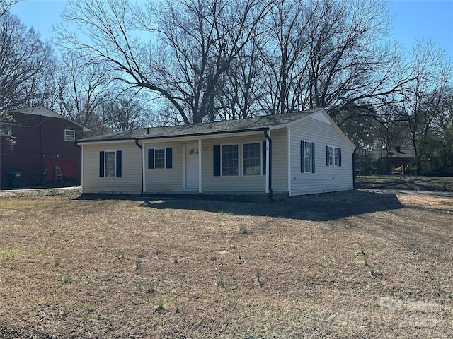 single story home featuring a porch