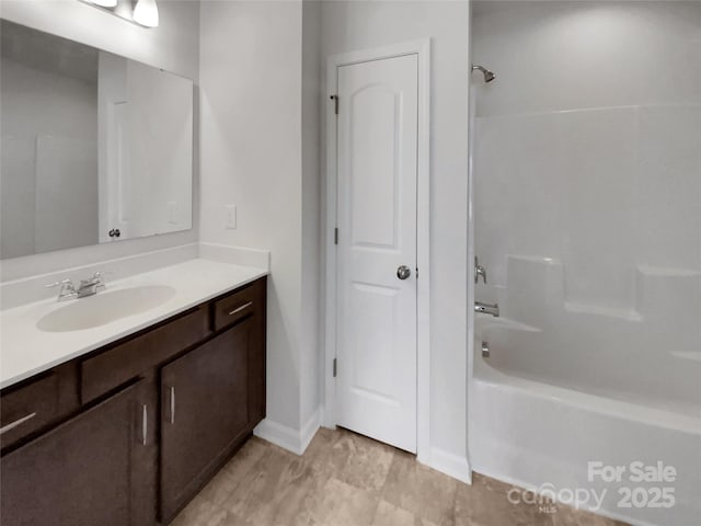 full bathroom featuring vanity and shower / bathtub combination