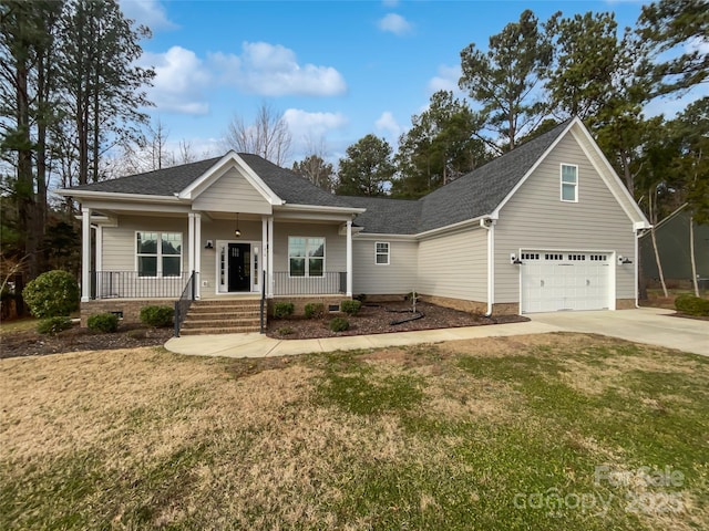 view of front of home with covered porch, concrete driveway, a front lawn, and an attached garage