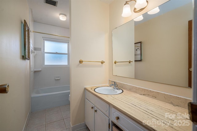 full bathroom featuring vanity, baseboards, visible vents, shower / washtub combination, and tile patterned floors