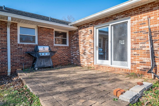 view of patio with a grill