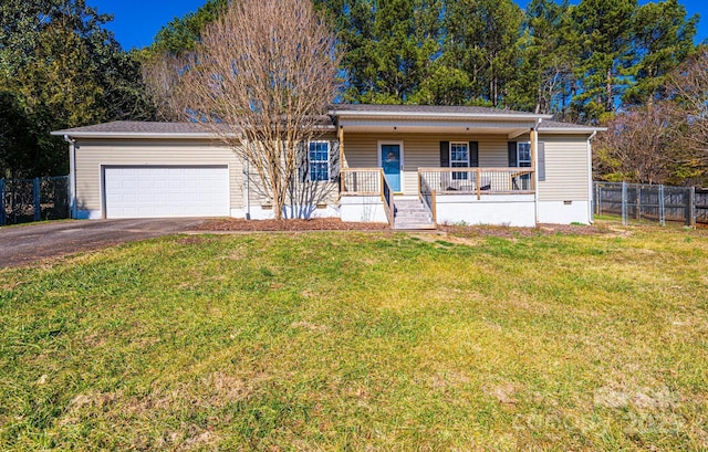 ranch-style house with a porch, aphalt driveway, a garage, fence, and a front yard