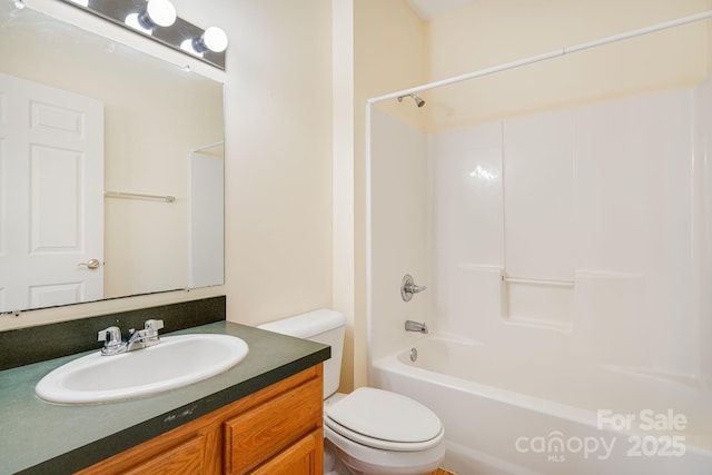 full bathroom with toilet, vanity, and bathing tub / shower combination