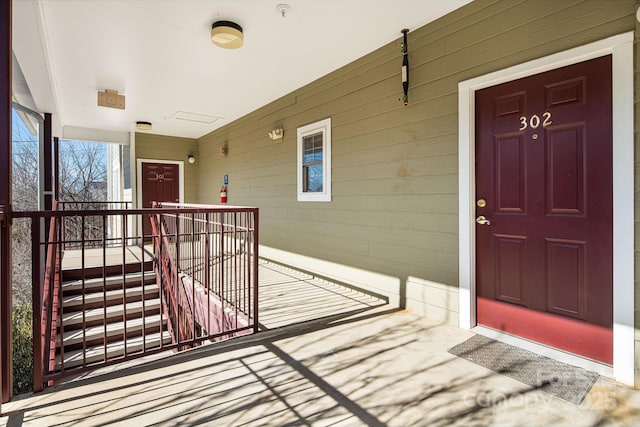 entrance to property with covered porch