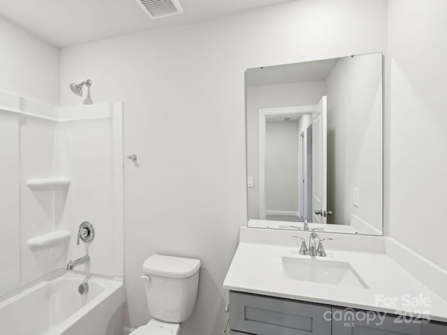 bathroom featuring visible vents, shower / tub combination, vanity, and toilet