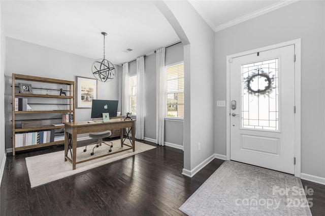 foyer entrance featuring arched walkways, visible vents, baseboards, wood-type flooring, and crown molding