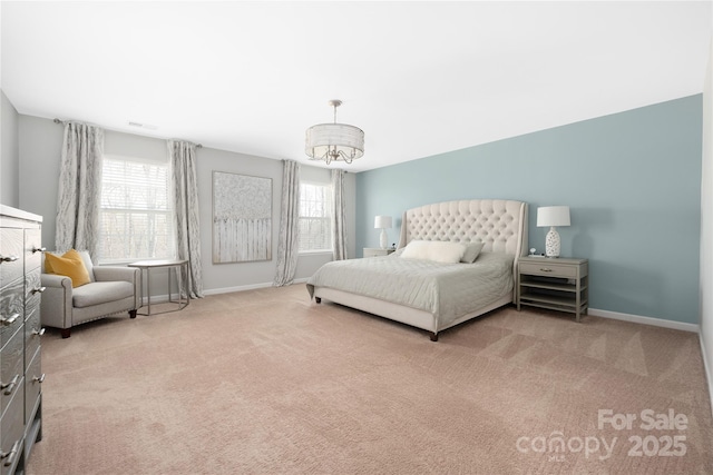 carpeted bedroom with baseboards