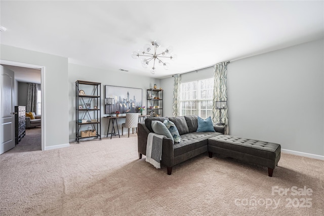 living area featuring a chandelier, carpet floors, visible vents, and baseboards