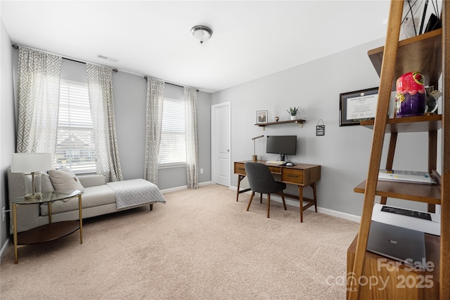 home office featuring carpet floors, visible vents, and baseboards