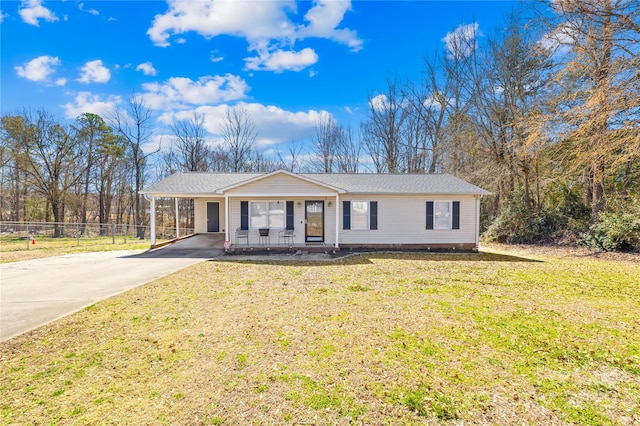 single story home featuring driveway, an attached carport, covered porch, fence, and a front lawn