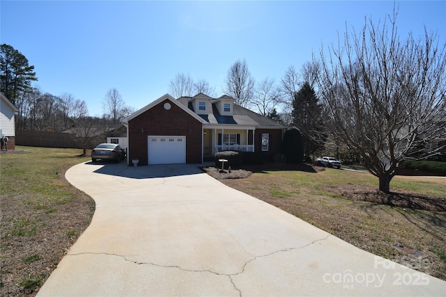 view of front of home with a garage, concrete driveway, a front lawn, and a porch