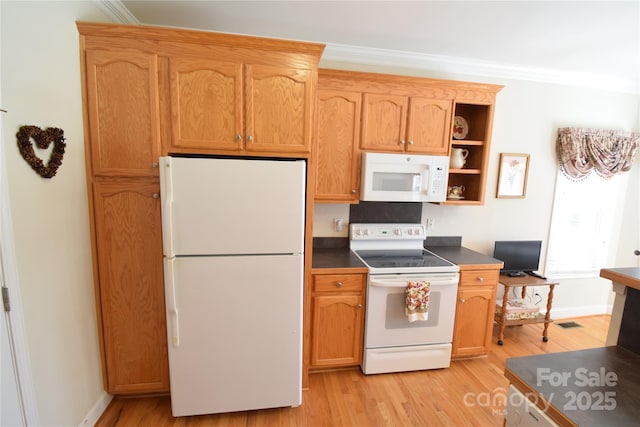 kitchen featuring white appliances, light wood finished floors, dark countertops, ornamental molding, and open shelves