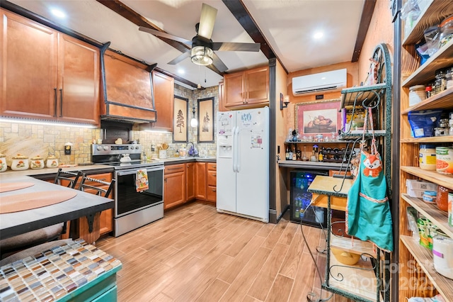 kitchen with white fridge with ice dispenser, an AC wall unit, brown cabinets, and stainless steel range with electric cooktop