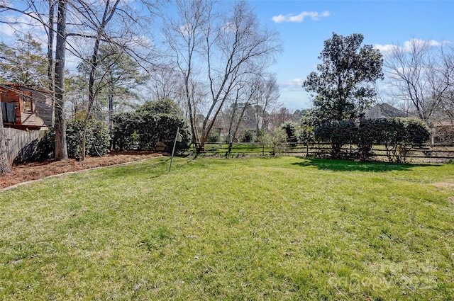 view of yard with fence