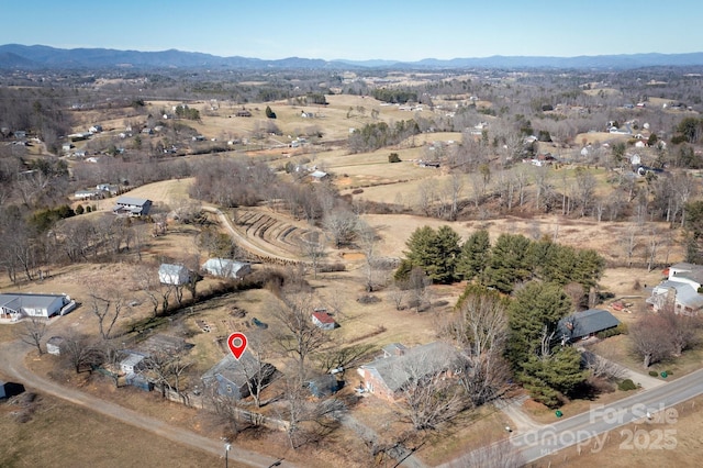 aerial view featuring a mountain view