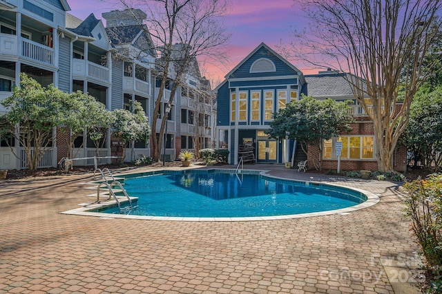 community pool with french doors