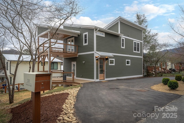 200 Stafford St, Black Mountain, NC 28711 - view of front facade with driveway and a balcony